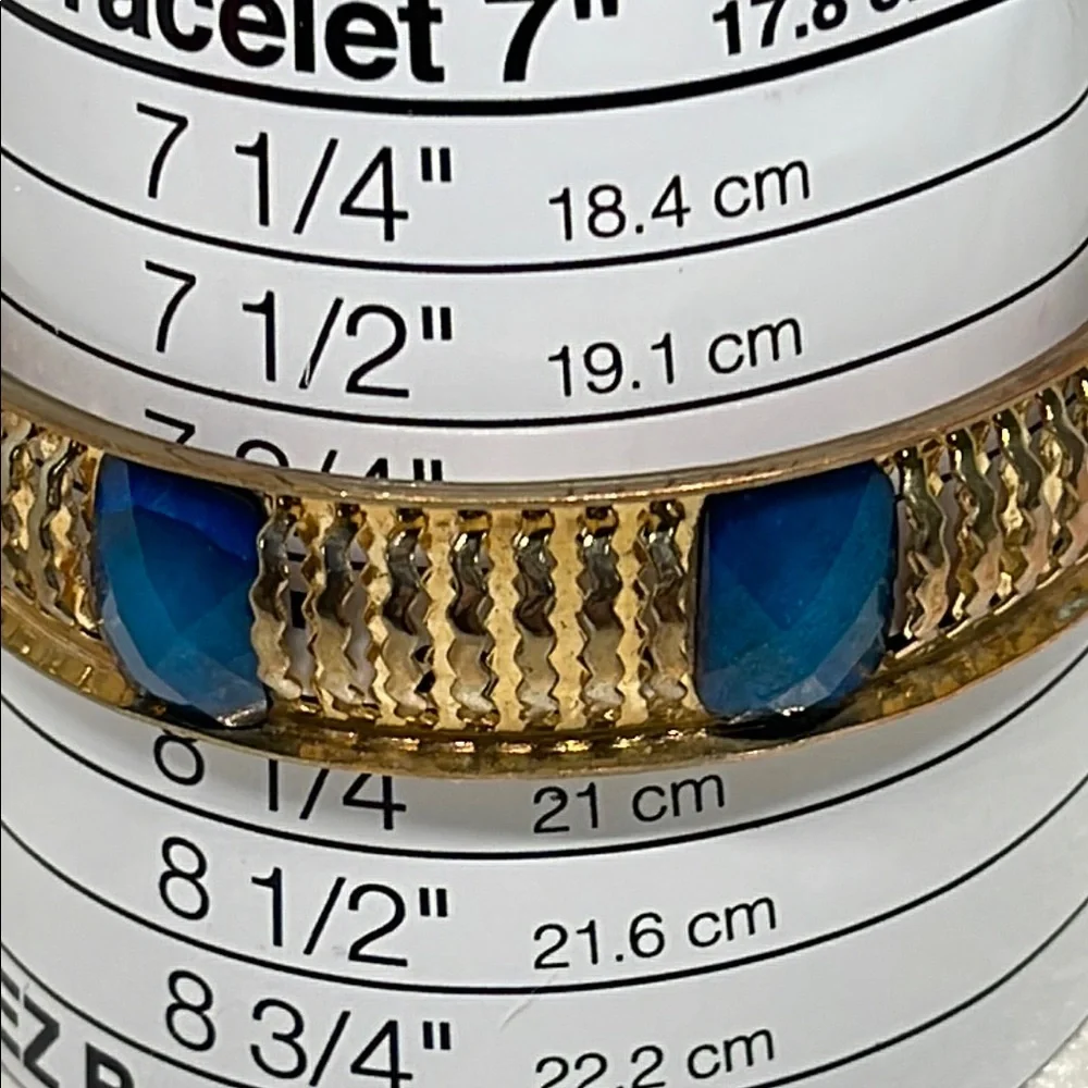 Goldtone and faceted Blue Bangle Bracelet